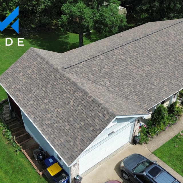 Finished architectural shingle roof with hip and valley lines