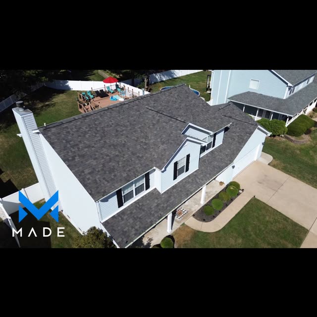 Finished roof on a white home viewed from above