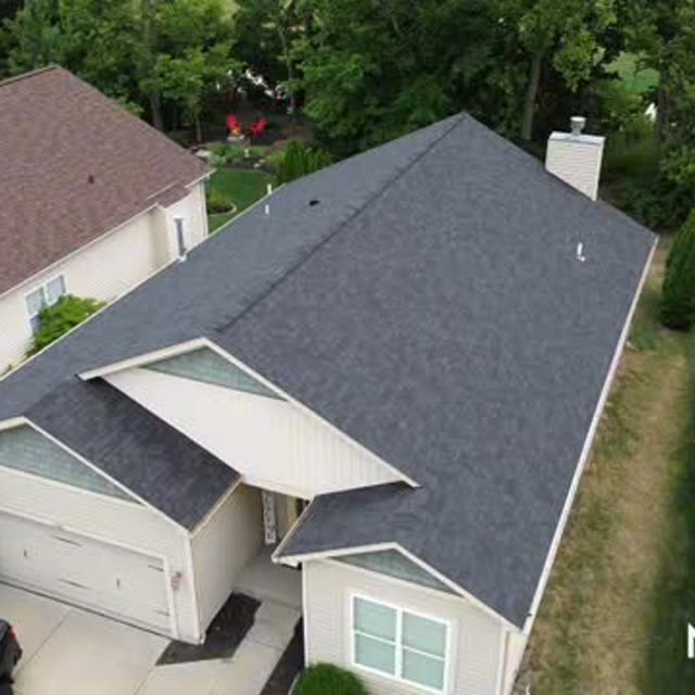 Completed charcoal roof on a multi-level home
